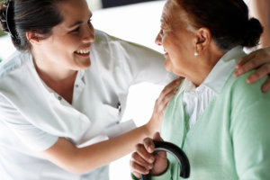 caregiver and elderly woman talking
